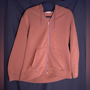 Brown sweater with zipper in front and hoodie
